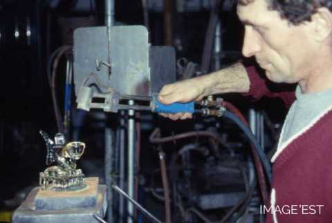 Réchauffage d'une pièce au chalumeau (Portieux)